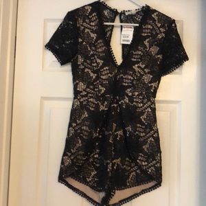 Brand new black and tan romper